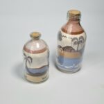 Dessin sur sable fin en bouteille